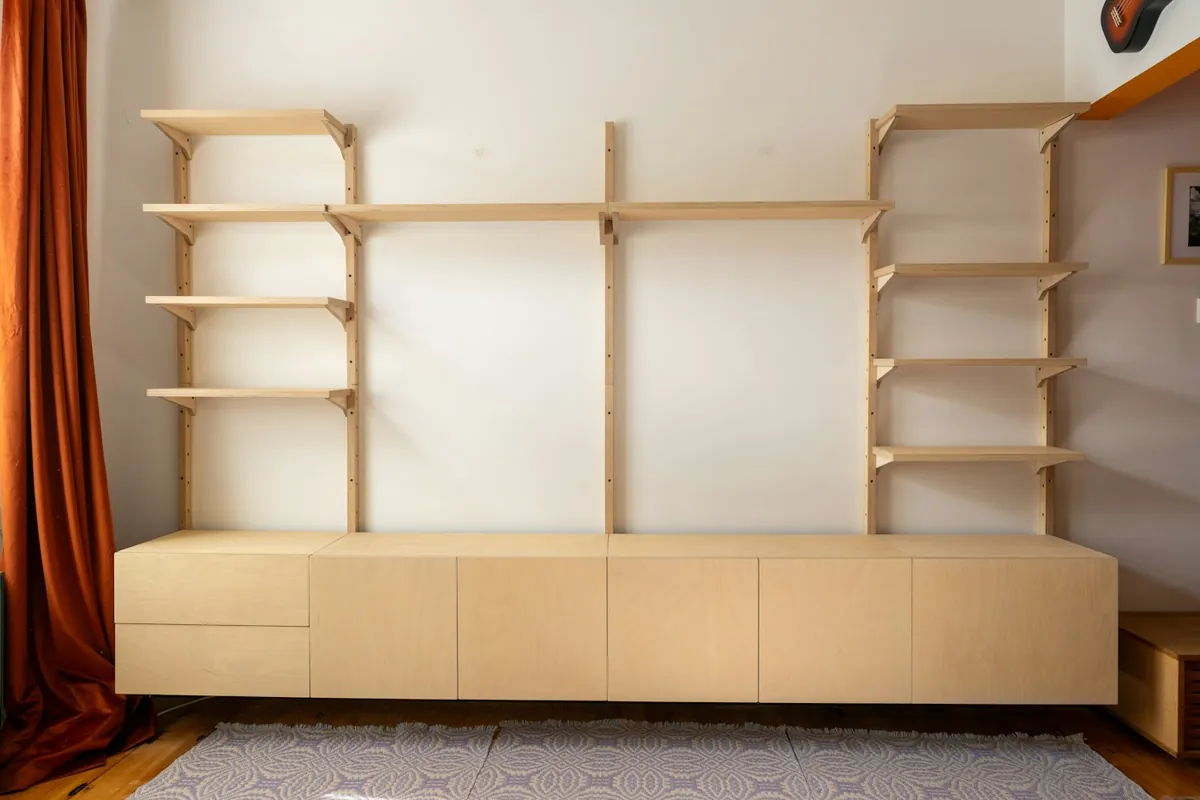 A carefully aligned plywood cabinet run with even reveals, the result of a properly levelled installation